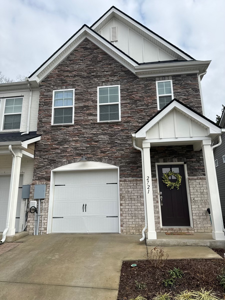 Door Replacement in Nashville, TN,New custom front entry door installed on upscale Brentwood home exterior