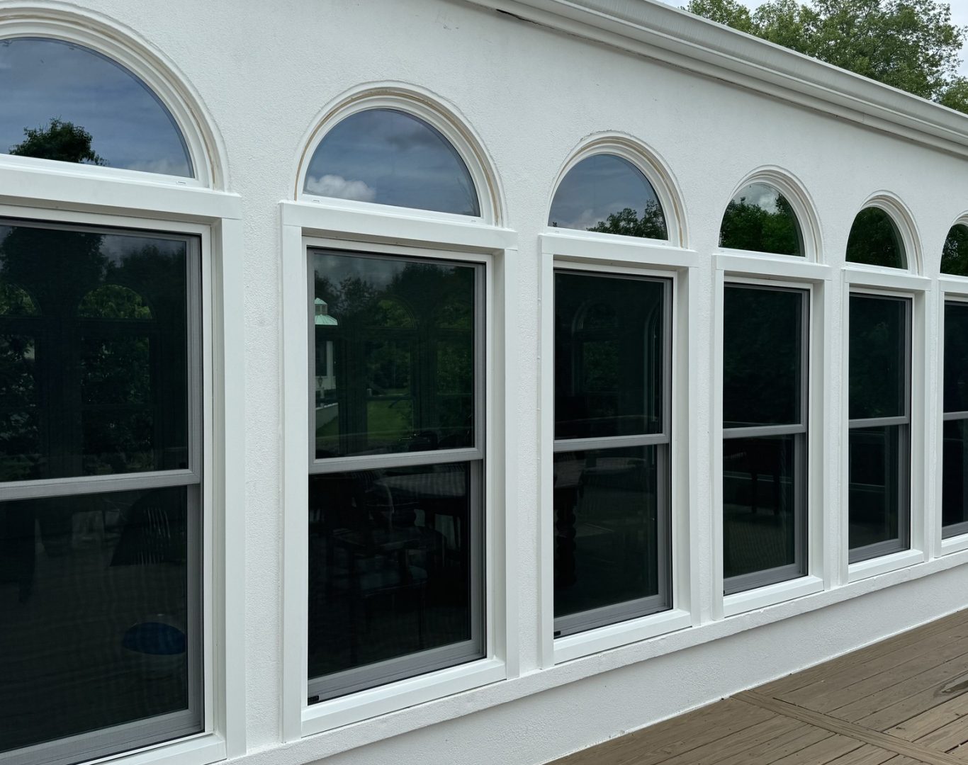 About Skylight Windows, Doors Roofing, your Expert Window And Door Replacement in Nashville, TN, Window specialist measuring and aligning premium frame components for precise installation